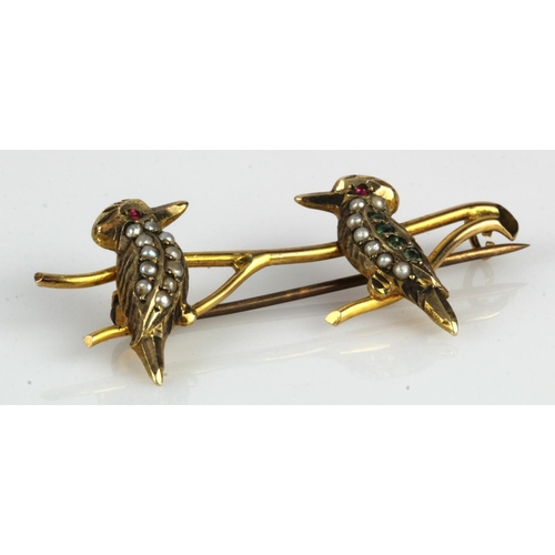 585 - Yellow gold (tests 9ct) vintage kookaburra brooch, stones include ruby, seed pearls and emerald, len... 