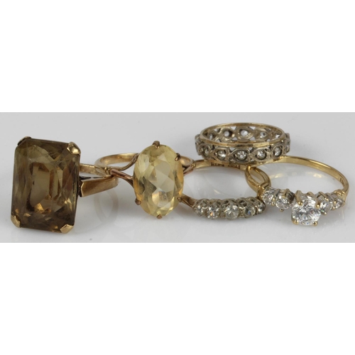 611 - Five dress rings to include one 14ct gold CZ set ring. Four 9ct gold/tests 9ct rings stones include ... 