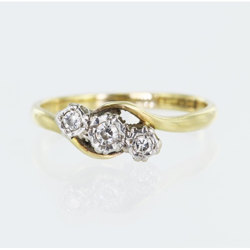 63 - Yellow gold (tests 18ct) diamond trilogy ring, set with three graduating round brilliant cut diamond... 