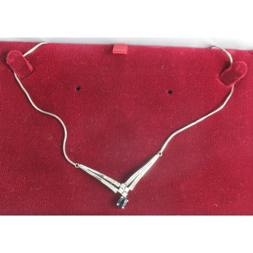 631 - 9ct white gold diamond and sapphire wishbone necklet, wishbone pendant set with one 6mm x 4mm sapphi... 