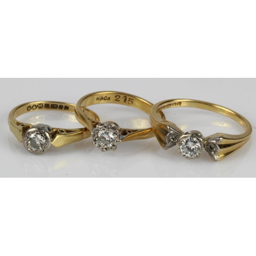 637 - Three yellow gold (tests 18ct) diamond solitaire rings, diamond weights approx. 0.14ct, 0.20ct, 0.25... 