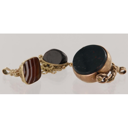 648 - Three 9ct yellow gold fob pendants, stones include onyx, banded agate and bloodstone, total weight 1... 