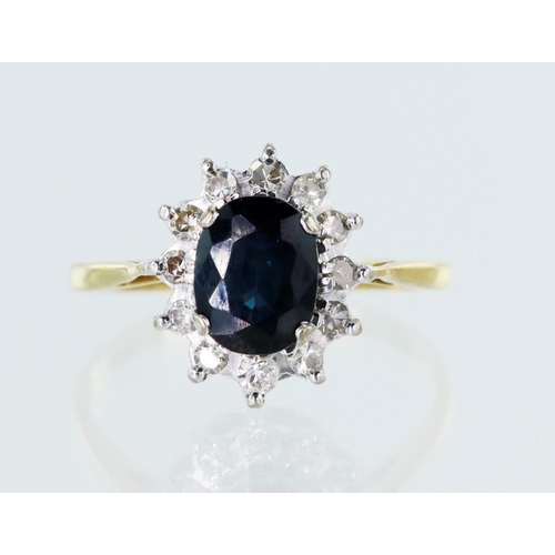 66 - 18ct yellow gold diamond and teal sapphire cluster ring, oval sapphire approx. 1.63ct, surrounded by... 