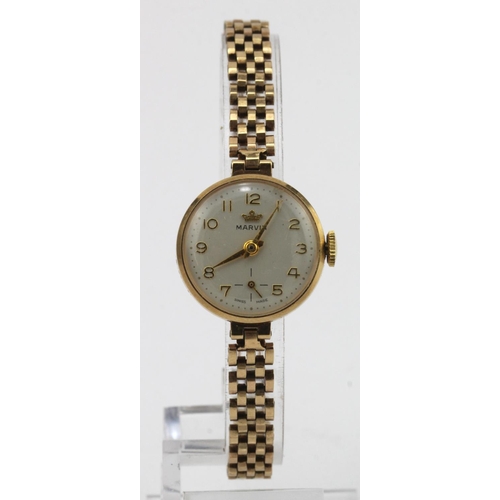 667 - Ladies 9ct cased Marvin manual wind wristwatch. Hallmarked Edinburgh 1966. On a 9ct bracelet. Total ... 