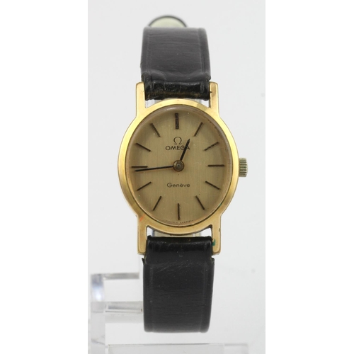 689 - Ladies Omega Geneve manual wind wristwatch circa 1974. The gold oval dial with gilt baton markers. O... 