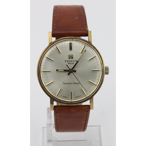 694 - Gents 9ct ? Cased Tissot Seastar Seven wristwatch. Case diameter approx. 34mm, working when catalogu... 