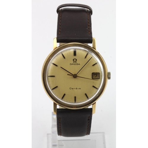 702 - Gents 9ct cased Omega Geneve manual wind wristwatch. The cream dial with gilt baton markers, date ap... 