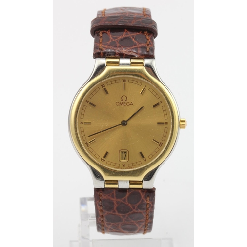 710 - Ladies Omega quartz wristwatch, circa late 1980s, The round gold dial with gilt baton markers, date ... 