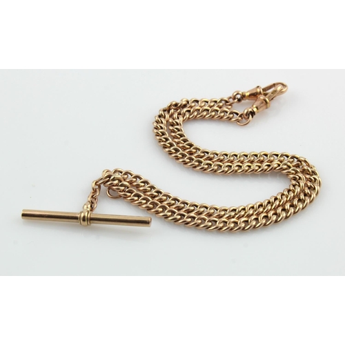 806 - Rose gold (tests 9ct) double Albert pocket watch chain, curb links with T-bar suspended in the middl... 