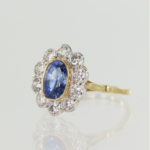 91 - Yellow gold (tests 18ct) diamond and sapphire cluster ring, oval cornflower sapphire approx. 1.82ct,... 