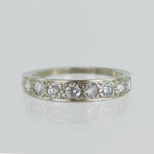 92 - White gold (tests 18ct) diamond half eternity ring, nine graduating round diamonds TDW approx. 0.51c... 