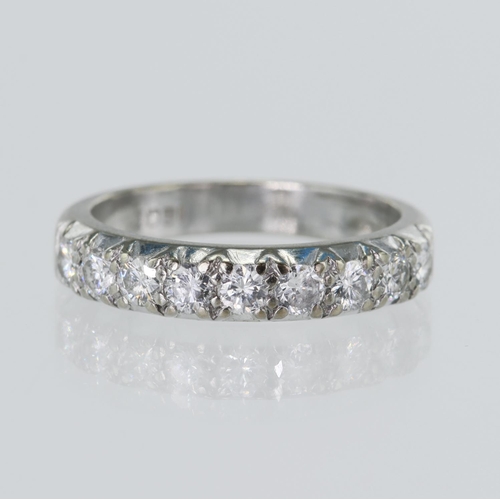 94 - White gold (tests 18ct) diamond half eternity ring, TDW approx. 0.63ct, set with nine round brillian... 