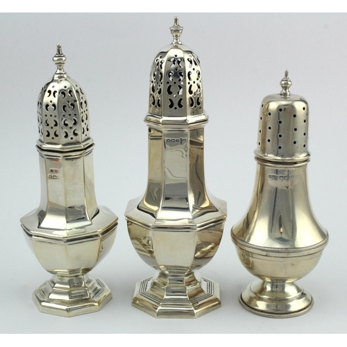 963 - Sugar Sifters. Three silver hallmarked sugar sifters, tallest 18cm approx., total silver weight 12oz... 