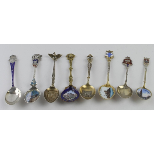 977 - Enamel Teaspoons. A group of eight mostly silver & white metal enamel decorated teaspoons, including... 