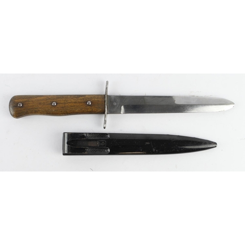 1009 - German WW2 original boot knife in its black scabbard brought back by a soldier as a souvenir from No... 