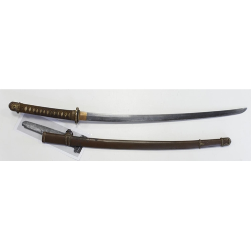 1094 - WW2 Japanese Officers Sword with an ancient family blade. The sword is in an Nco’s metal scabbard. I... 