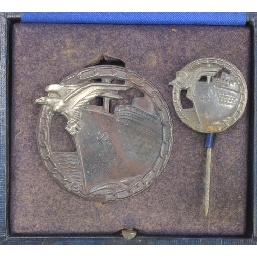 1154 - German Blockade Breakers badge in fitted case with lapel version.