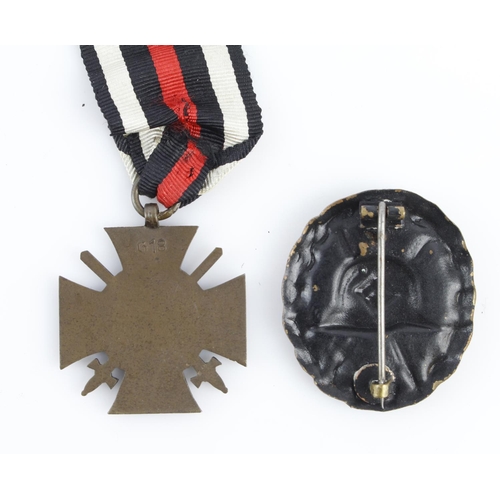 1164 - German Cross of Honour with wound badge in black both with award documents to Jakob Strobel.