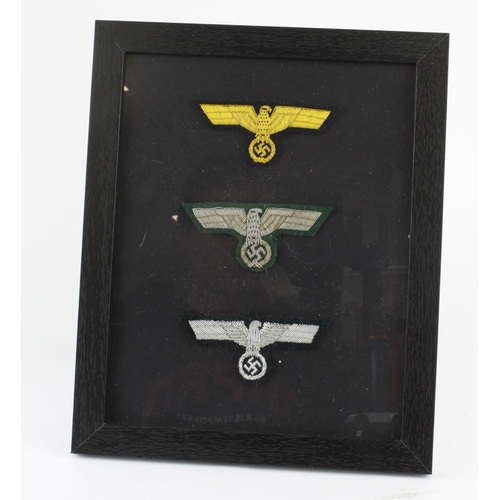 1179 - German framed group of officers breast eagles.