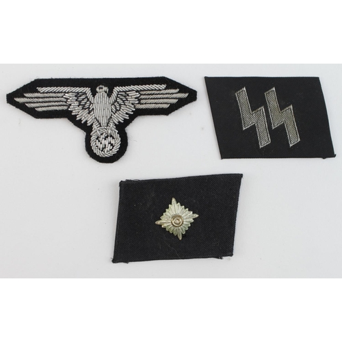 1285 - German SS NCO collar tabs with SS sleeve eagle.