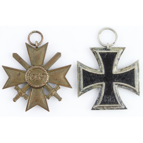 1325 - German WW2 Iron Cross 2nd Class maker marked '4' to ring, and a War Merit Cross with Swords.  (2)