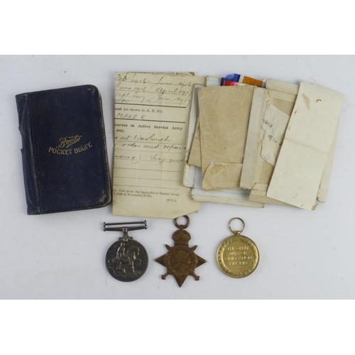 1443 - 1915 Star Trio named 9062 Pte J Capstick A.Cyc.Corps. With box of issue, pocket diary 1916, etc. A c... 