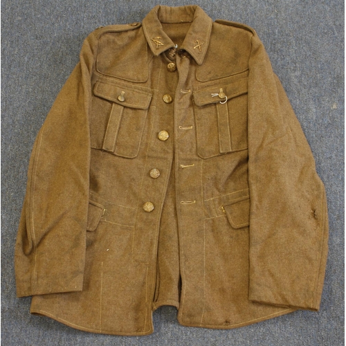 1453 - Army service jacket '22 pattern, with Middlesex brass titles pioneer collar badges very similar to t... 