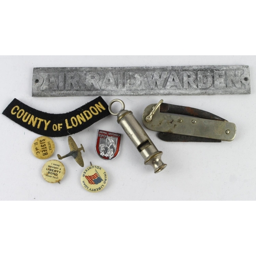 1454 - ARP 1939 dated pocket knife, whistle, alloy door sign and lapel badges.