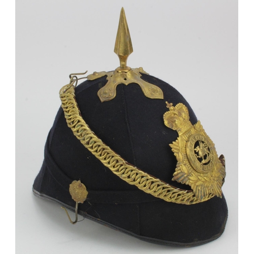 1505 - Blue Cloth helmet, likely a later Tattoo example, complete with chin strap & lining, badged to The B... 