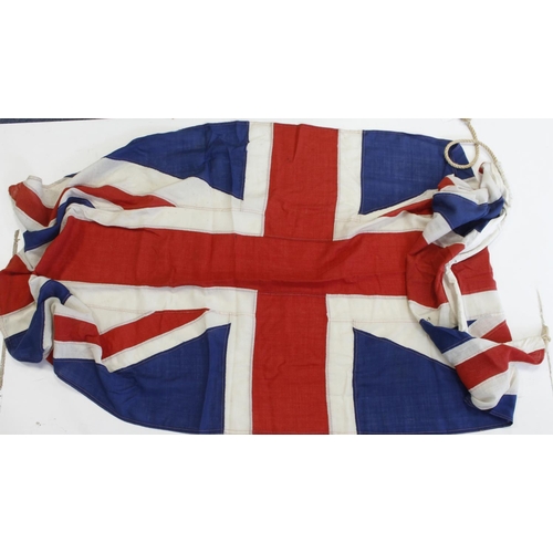 1523 - British union jack flag in good condition some small holes noticed.  Size 33x80 inches.