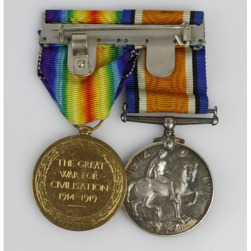 1545 - BWM & Victory Medal to (146915 Pte H E Collins MGC). Entitled to the Silver War badge.  (2)