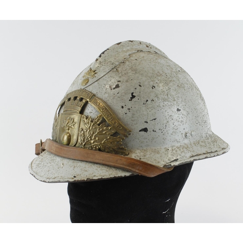 1602 - French WW2 fireman’s helmet all complete with liner and chin strap.