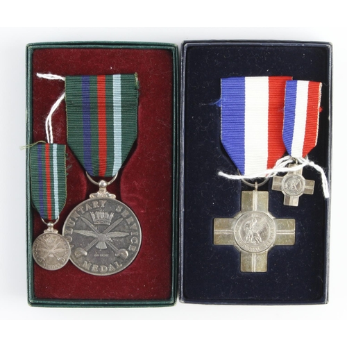 1604 - General Service Cross and Voluntary Service Medal, both hallmarked silver, unnamed in boxes of issue... 