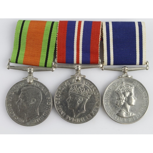 1613 - Group mounted as worn - Defence & War Medals, QE2 Police LS Medal (Sergt William G. Saunders).   (3)