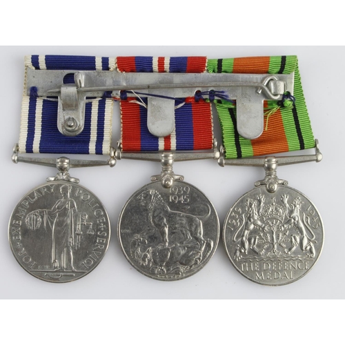 1613 - Group mounted as worn - Defence & War Medals, QE2 Police LS Medal (Sergt William G. Saunders).   (3)