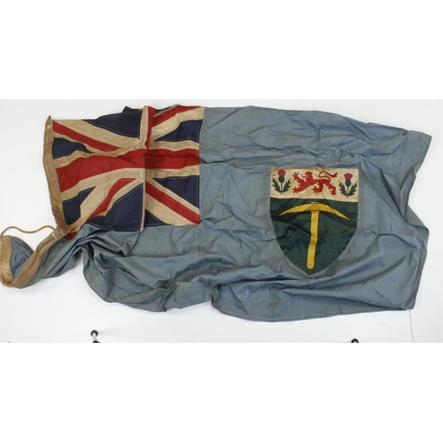 1762 - Rhodesia a 5 feet long flag, makers label (Salisbury) service wear.