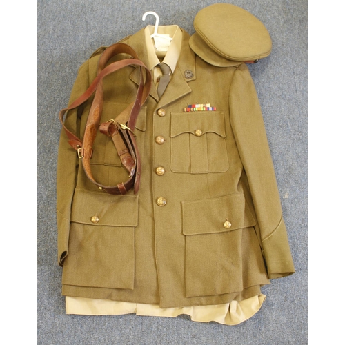 1956 - WW2 officers uniform jacket, trousers and hat with Sam brown to a Captain in the Bedfordshire and He... 