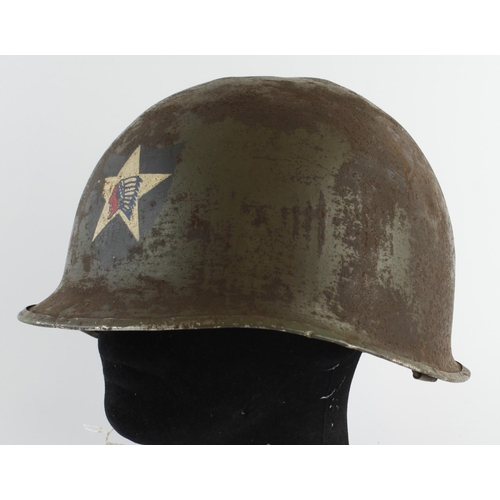 1973 - WW2 US McCord Swivel Bale Front Seam M1 Helmet with 2nd Infantry Division Insignia.