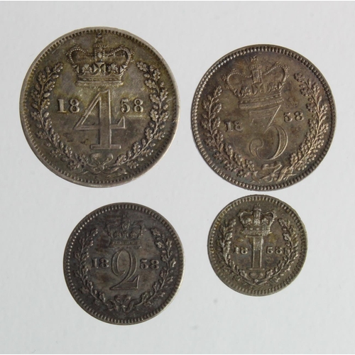 203 - Maundy Set 1858, mixed grade: 4d GVF, 3d GEF, 2d aEF, 1d EF, some adhesive residue on all coins.