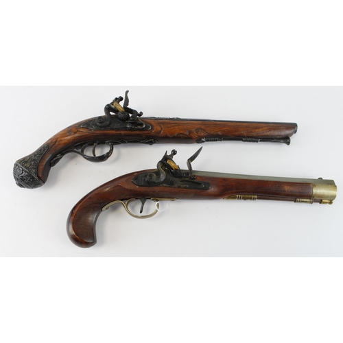 963 - Flintlock replica Pistols, metal construction with wooden stocks, actions cock at all stages on both... 