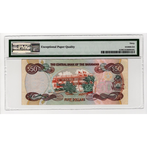 142 - Bahamas 50 Dollars dated 1996, signed James H. Smith, serial H874197 (TBB B327a, Pick61) in PMG hold... 