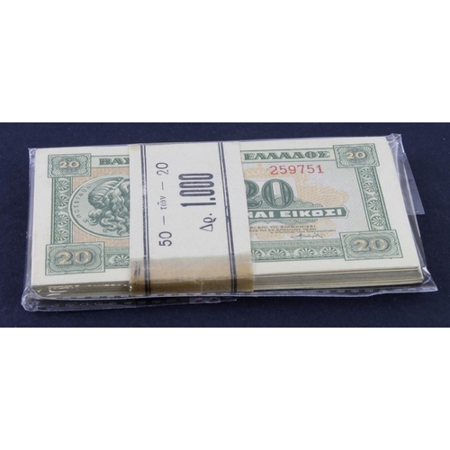 319 - Greece 20 Drachmai (50) dated 6th April 1940, a consecutively numbered run in original bank band, se... 