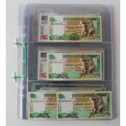429 - Sri Lanka (28), an Uncirculated group in album pages, 10 Rupees, 20 Rupees, 50 Rupees, 100 Rupees, 2... 