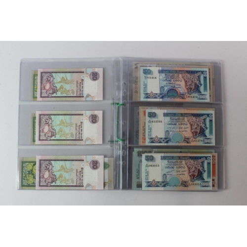 429 - Sri Lanka (28), an Uncirculated group in album pages, 10 Rupees, 20 Rupees, 50 Rupees, 100 Rupees, 2... 