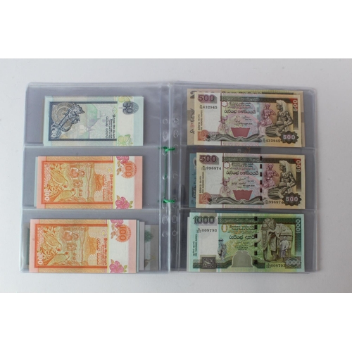 429 - Sri Lanka (28), an Uncirculated group in album pages, 10 Rupees, 20 Rupees, 50 Rupees, 100 Rupees, 2... 