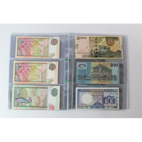 429 - Sri Lanka (28), an Uncirculated group in album pages, 10 Rupees, 20 Rupees, 50 Rupees, 100 Rupees, 2... 