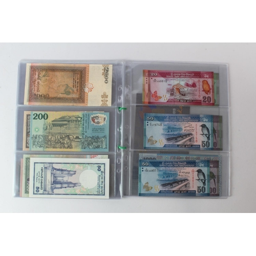 429 - Sri Lanka (28), an Uncirculated group in album pages, 10 Rupees, 20 Rupees, 50 Rupees, 100 Rupees, 2... 