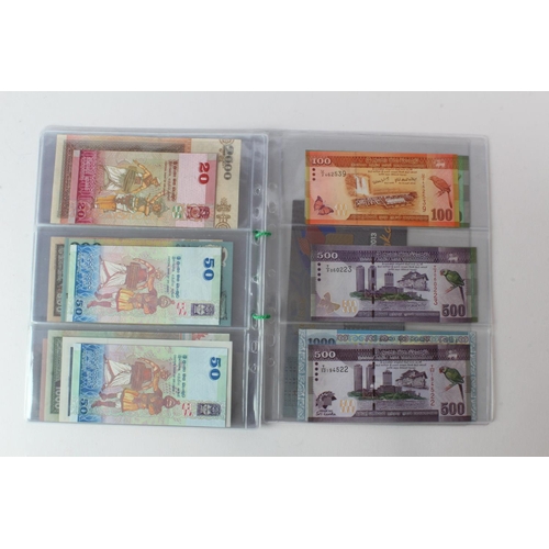 429 - Sri Lanka (28), an Uncirculated group in album pages, 10 Rupees, 20 Rupees, 50 Rupees, 100 Rupees, 2... 