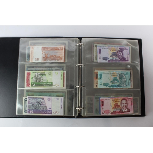 474 - World (178) an Uncirculated collection of world notes in album, all different (some same design and ... 