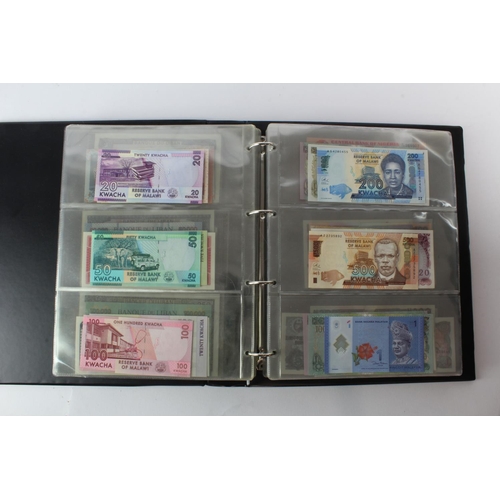 474 - World (178) an Uncirculated collection of world notes in album, all different (some same design and ... 